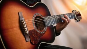 Read more about the article Top 7 Beginner Acoustic Guitar Tips to Strum Like a Pro